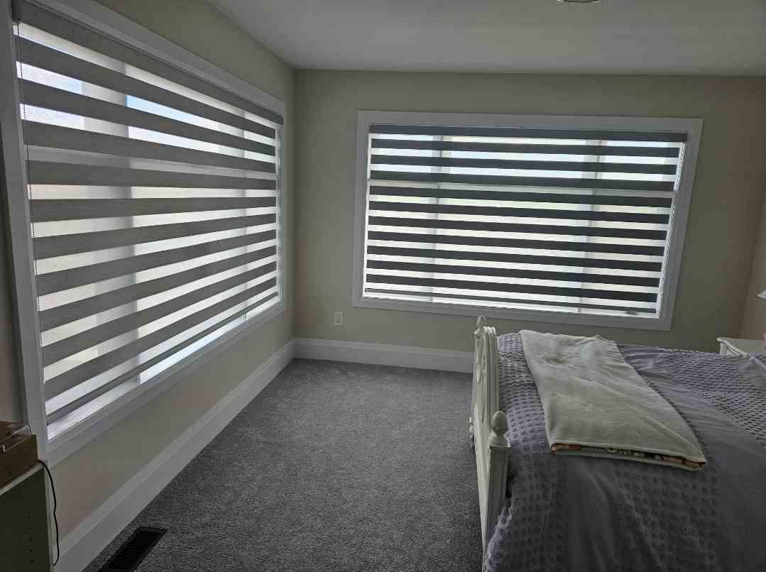 Custom shutters and blinds in a stylish Brooklyn bedroom setting."